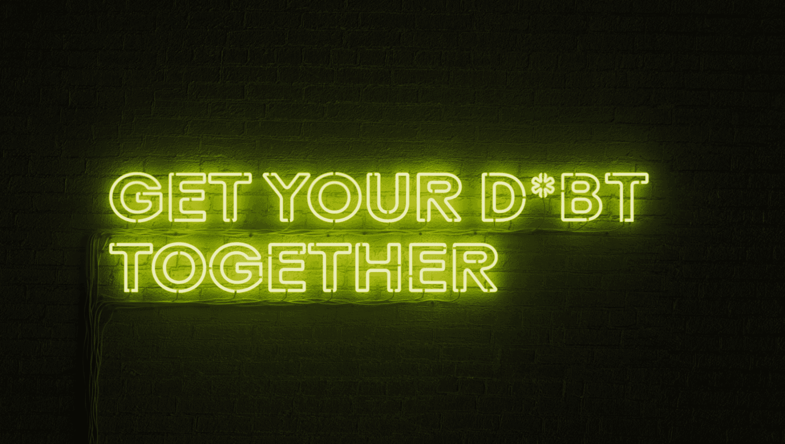 A sign reading, "get your debt together"