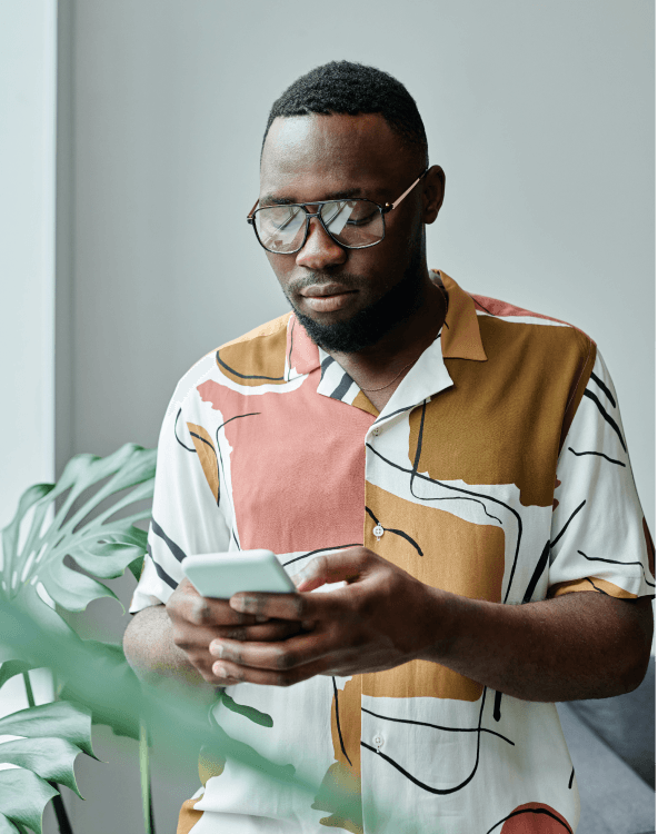 man looking at a phone