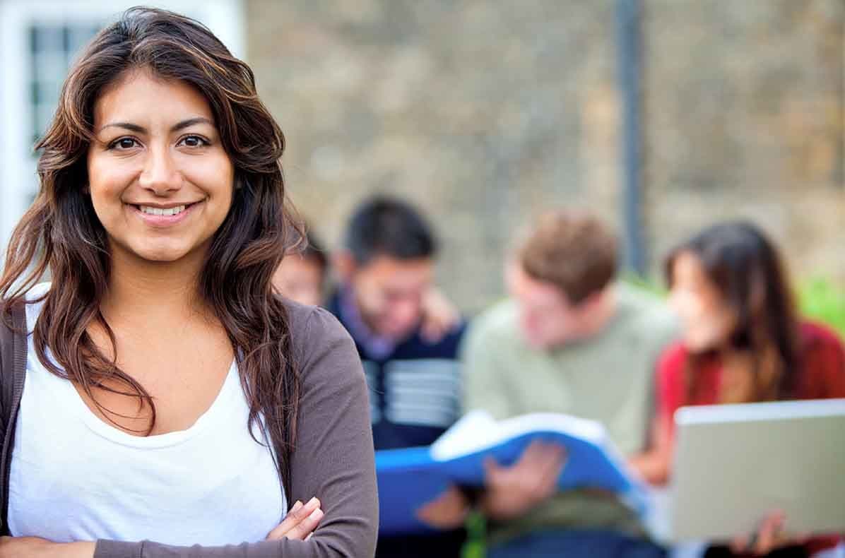 Young woman with her arms crossed wondering about student loan forgiveness