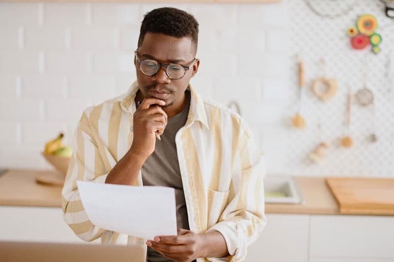 Man considers getting a personal loan.